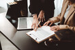 © Daenin - People discussing a contract agreement in a business meeting, reviewing legal documents with an attorney, offering professional advice and signing paperwork
