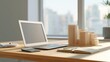 © 69 - Modern office workspace with laptop computer calculator open notebook and architectural model on wooden desk by large window with city view daylight