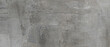 © UmmeFarhatunnesa - Concrete background features a dark grey weathered cement wall surface with fine rustic linear textures