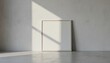 © Abrar - Blank square canvas art mockup leaning on concrete wall with sunlight shadow. Minimalist interior design, empty frame template for artwork, photo, print, poster presentation