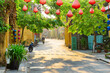 © efired - Amazing cozy street decorated with silk lanterns, Vietnam