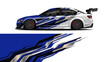© Lailatul - Sleek blue and white racing car with bold graphic livery and aerodynamic styling.