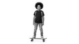 Young boy with backpack standing on a skateboard