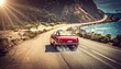 © Mustafa - Red Convertible Car Driving on Coastal Road.