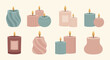 © art.Co - Collection of various decorative scented candles with burning flames.