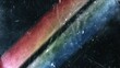 © Jinhao - Abstract worn‑textured backdrop with two broad parallel light streaks cutting through dark scratched surface, left streak blending red‑pink‑orange tones, right streak transitioning light green‑light