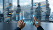© 沈军 贡 - Two adult male hands interact with a futuristic holographic global financial data dashboard, viewing live market, sales and logistics analytics in a modern office.