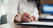 © peopleimages.com - Woman, hands and lawyer writing with contract for legal agreement, signature or testimony in office. Female person, attorney or signing with paperwork, policy or form for private legislation or lease