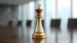 © buraratn - Golden chess king piece on a polished wooden table in a modern conference room with large windows and a professional corporate atmosphere