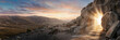 © Faith Stock Studio - Empty stone tomb with bright light shining from inside. Wide panoramic landscape of the biblical resurrection cave at sunrise. Happy Easter banner background with copy space on the left