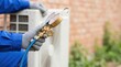 © SimpleDesignStudio - HVAC Technician Checking Refrigerant Pressure Levels on Outdoor Air Conditioning Unit with Manifold Gauge Set