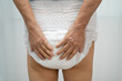 © amazing studio - Asian senior woman patient wearing incontinence diaper.