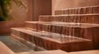 © Bio-Logic Lab - Water gently flowing over terracotta terraces, luxury modern spa water feature design