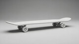 A white skateboard lies on a plain gray surface with wheels visible.