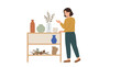 © UltraDesigns - Woman arranging decorative objects on a shelf with vases and plants PNG Isolated on transparent background
