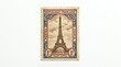 © Irvan - Vintage French postage stamp featuring the iconic Eiffel Tower in Paris, a symbol of heritage and historical communication, presented with intricate philatelic detail