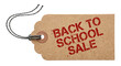 © Muzahidul - Brown cardboard price tag with string and red stamped text back to school sale isolated on white background