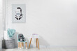 © New Africa - Different toys, small chair, table and picture in child's room, space for text