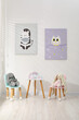 © New Africa - Different toys, small chairs, table and pictures in child's room