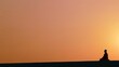 © onlyAW - Buddhist monk meditating at sunset