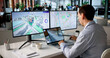 © Andrey Popov - Engineer Studies Urban Property Maps On Laptop Using BIM