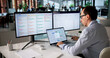 © Andrey Popov - Man Monitors Compliance Dashboard On Laptop
