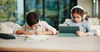 © peopleimages.com - Homework, headphones and children in home with tablet, activity and project or academic app. Homeschool, tech and siblings in kitchen with document, digital lesson or assessment in remote education