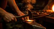 © G_Kawi - Ferreiro trabalhando, martelando metal em uma bigorna em uma oficina com iluminação aconchegante.