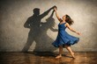 © Fotograf - A woman wearing a blue dress dances in a joyful moment, suitable for use as a background or illustration