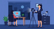 © Bima - A businesswoman in a suit records a video presentation using a camera on a tripod while another woman works at a desk with a computer monitor in an office with a city night view.
