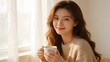 © 白 李 - Young woman holding a cup by window
