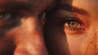 © Norman - Intimate Gaze: A striking close-up captures the intense connection between two individuals, with a focus on their piercing eyes and the warm, dramatic interplay of light and shadow