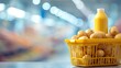 © pedro - Yellow basket overflowing with potatoes next to a drink bottle