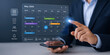 © Najem - A businessman interacting with a futuristic calendar interface on his smartphone