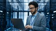 © DailyLens Studio - IT specialist managing cloud servers and data security in a high-tech data center.