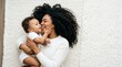 © Ada - Happy Mother and Baby Touching Cheeks with Copy Space