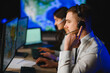 © Serhii - Dispatch team members managing communication in control center