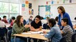 © phy - A teacher and students in a classroom, engaged in a discussion, with a whiteboard and various educational materials in the background.