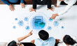 © InfiniteFlow - A group of professionals collaborates over a pivotal document, highlighting aspects of security and compliance within a modern business environment. Trope