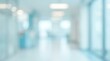 © Masque - Defocused hospital or clinic corridor with abstract blurred office interior background.