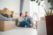 © Serhii - Couple planning new life in new home
