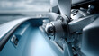 © visoot - Close up side view of metallic outboard motor propeller on modern boat, shiny silver blade detail, marine technology, calm water background