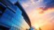 © Muhammad - Modern office building exterior at sunset