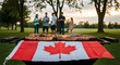 © Rani - Family gathering around barbecue with Canadian flag