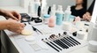© Maryia - Professional beauty workstation with disposable applicators, sanitized brushes and gentle skincare products for sensitive complexion makeup.