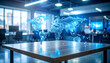 © fayyasin99 - A glowing blue 3D world map appears on a wooden table in a modern office with people working.
