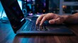 © MR HEPPY - Close up of a hand typing on a laptop keyboard