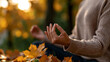 © Tetyana - Woman meditating in autumn park, finding inner peace and balance, practicing mindfulness and self care, enjoying wellness and healthy lifestyle outdoors, copy space