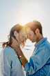 © Westend61 - Couple head to head on the beach at backlight