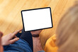 © baranq - Couple using tablet with blank screen at home